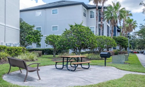 Enjoy our resident-only features a couple of picnic tables on a sidewalk