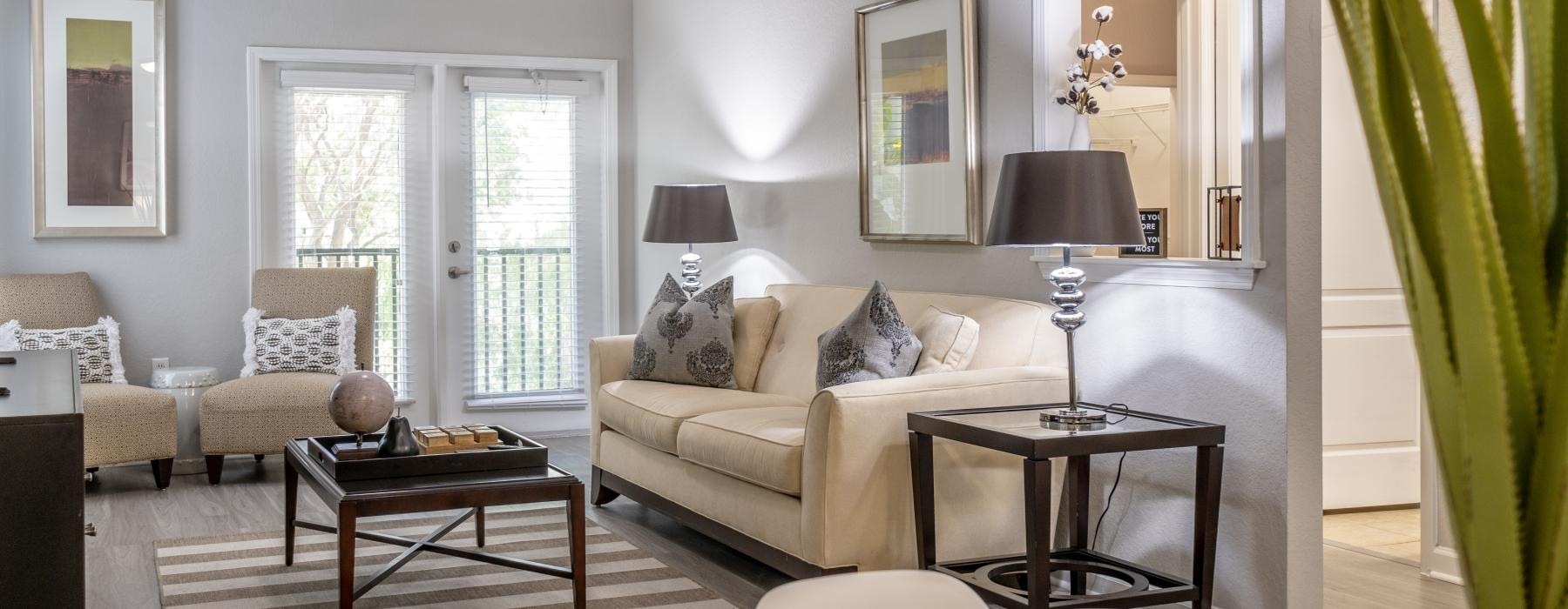 a living room with a couch and a table