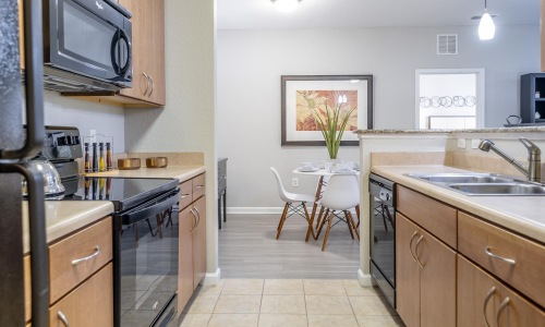 Beautiful kitchens with designer finishes a kitchen with a stove and oven
