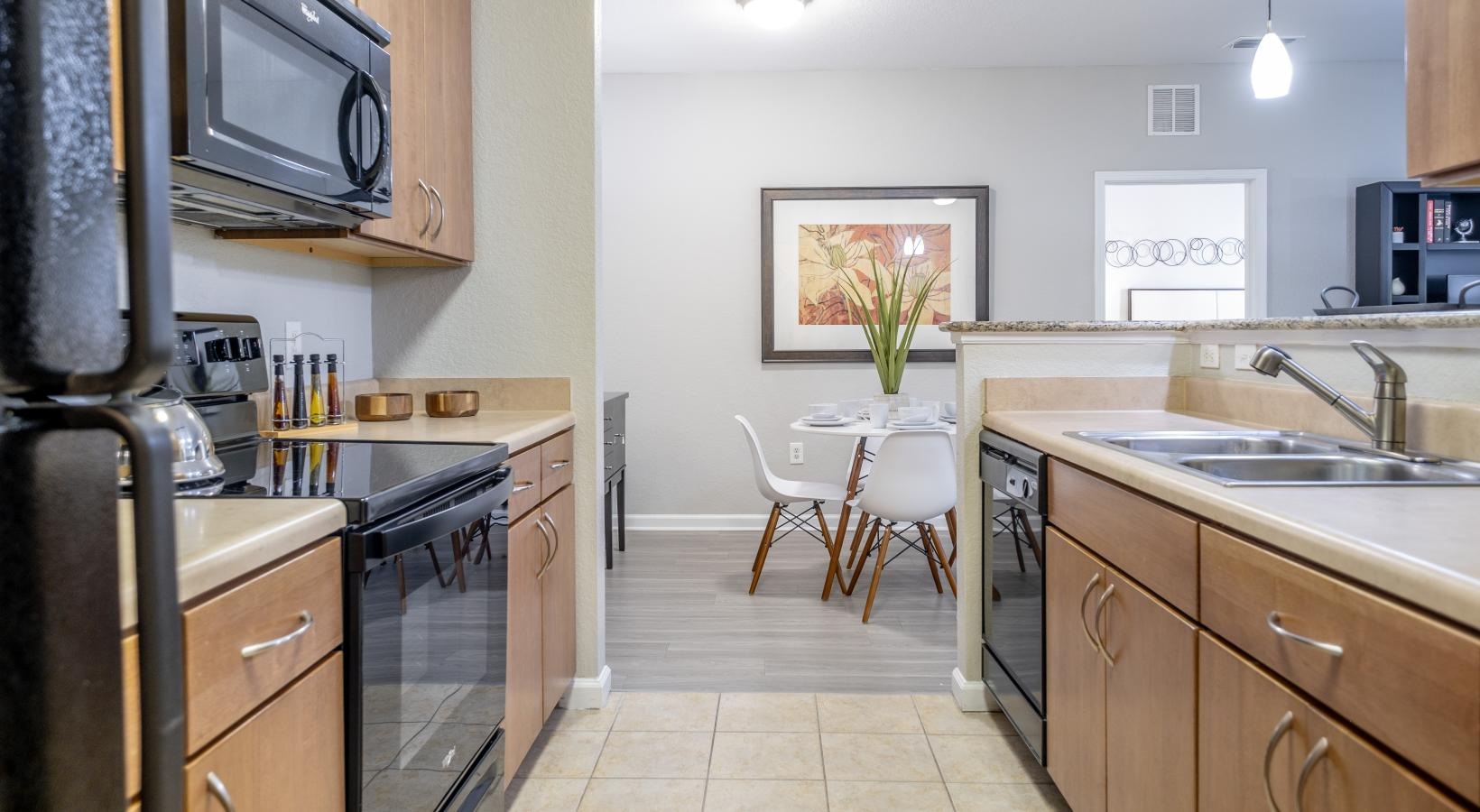 Beautiful kitchens with designer finishes a kitchen with a stove and oven