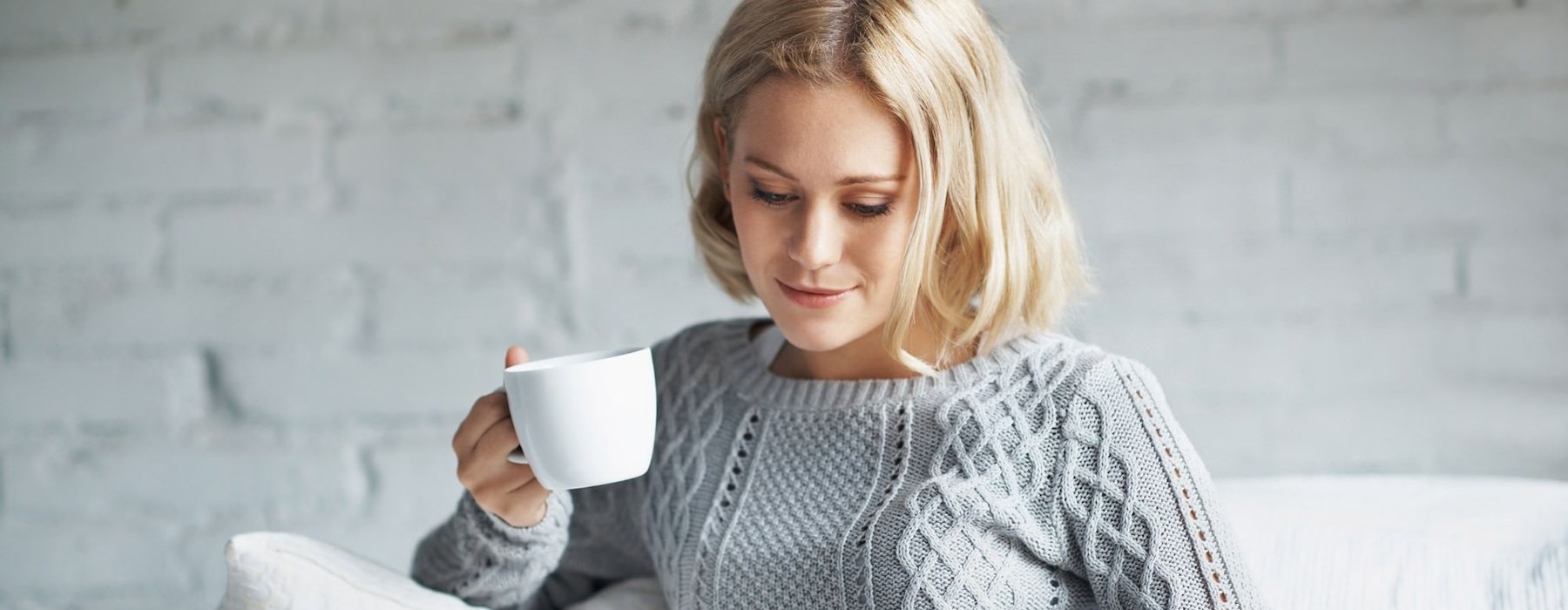 woman drinking coffee