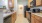 a kitchen with wooden cabinets