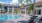 a pool with chairs around it