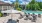 a pool with chairs and umbrellas