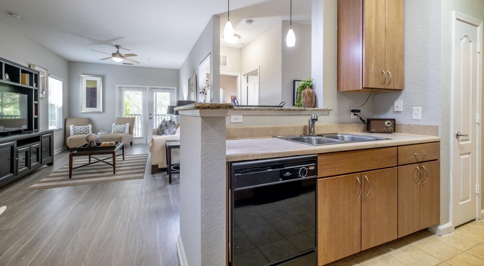 Spacious kitchens with thoughtful details a kitchen with wooden cabinets